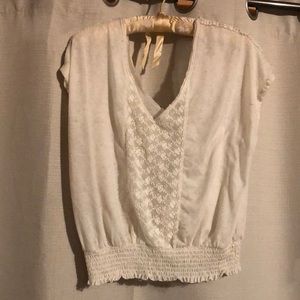 Beautiful cream colored free people top with lace panel in front